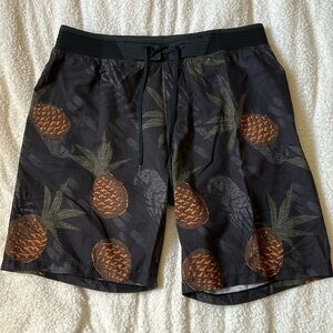 Hurley board shorts with bird and pineapple print. Size 31